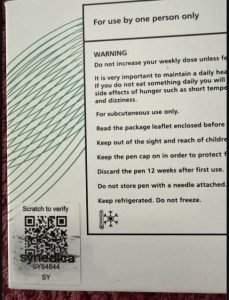Counterfeit verification sticker photo